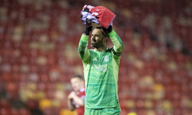 Aberdeen's Joe Lewis applauds the fans at full time after a 2-1 win over Dundee. Image: SNS.