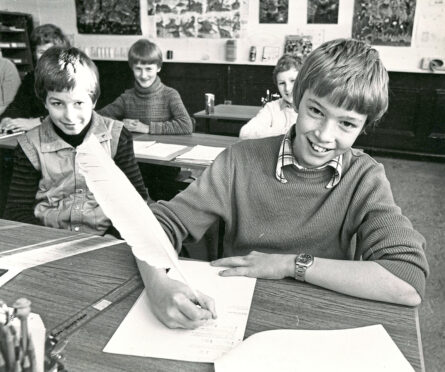Primary 7 Nicolaas Soek using a quill in 1981.