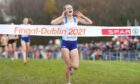 Great Britain's Megan Keith celebrates winning the women's Under 20 event during the SPAR European Cross Country Championships 2021 at Fingal-Dublin in Ireland. Photo by: Niall Carson/PA Wire.