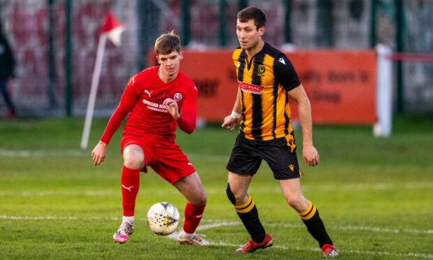 Huntly defender Michael Clark, right, hopes they can get the better of Aberdeen in the Evening Express Aberdeenshire Cup