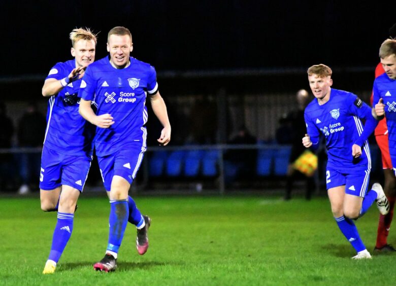 Peterhead captain Scott Brown celebrates his goal against Civil Service Strollers