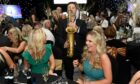 Saxophonist Konrad Wiszniewski helped get the party started at The Society Awards in 2019.