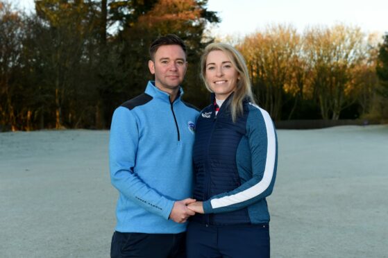 Laura Beveridge, right, pictured with husband and caddie Keil.