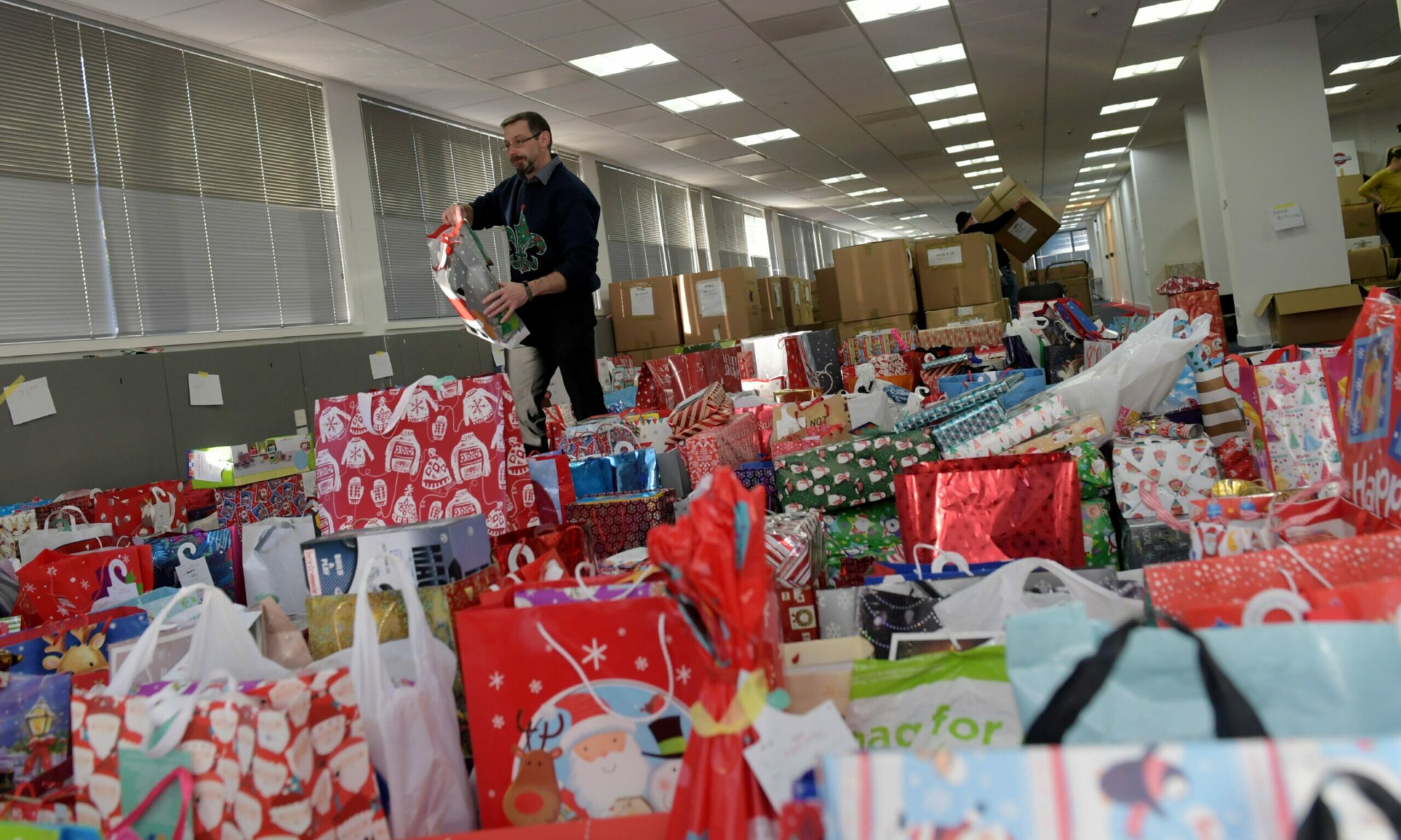 Instant Neighbour are collecting Christmas gifts but are short for the nearly 3,800 kids they have registered. Picture by Kath Flannery