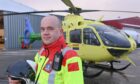 Going above and beyond: James Cursiter says it's an honour to be working his first Christmas as an air ambulance paramedic with Scotland's Charity Air Ambulance.