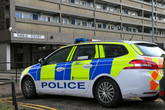 Police Scotland oustide Greig Court on Gerrard Street on Wednesday morning. Picture by Kenny Elrick