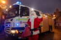 Santa arrives in Huntly after a last-minute community effort to ensure some festive cheer