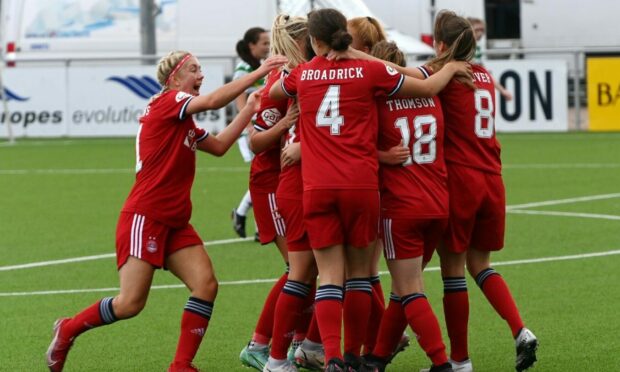 Aberdeen's young players celebrate scoring in SWPL 1.