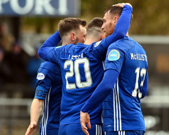 Robbie Leitch celebrates his goal for Cove against Clyde