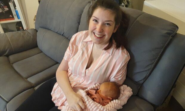 Lucy Lintott with her baby daughter.