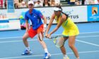 Great Britain's Jamie Murray with doubles partner, China's Peng Shuai, during their match against USA's Abigail Spears and Poland's Mariusz Fyrstenberg at the 2012 Australian Open in Melbourne.