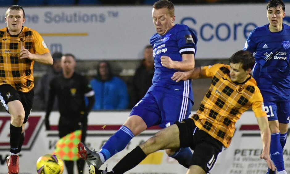 Peterhead captain Scott Brown in action against East Fife