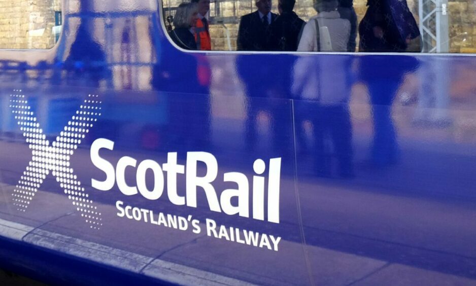 ScotRail logo on side of train.