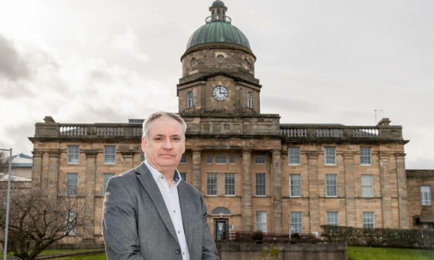 Moray MSP Richard Lochhead outside Dr Gray's Hospital.