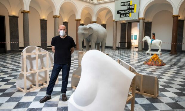 Artist Kenny Hunter in Aberdeen Art Gallery's Sculpture Court with his show called Sculpture Court.