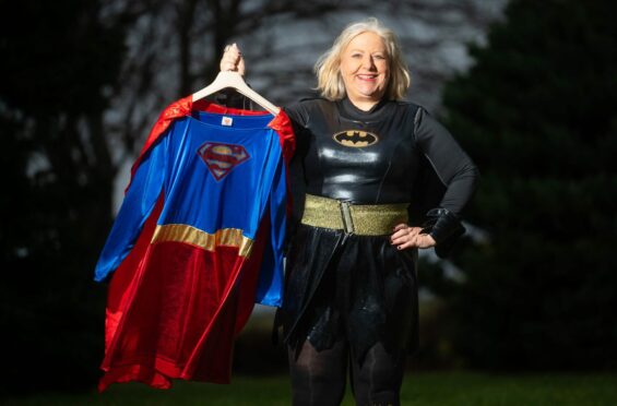 Veronica Young is keeping herself and other cancer patients positive by dressing as superheroes for her chemo treatments. Picture Michael Traill