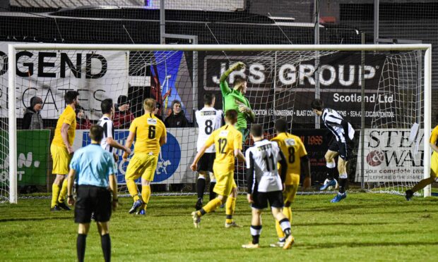Fraserburgh substitute Ryan Sargent scores his first goal after coming on at half time. Picture by Wullie Marr.