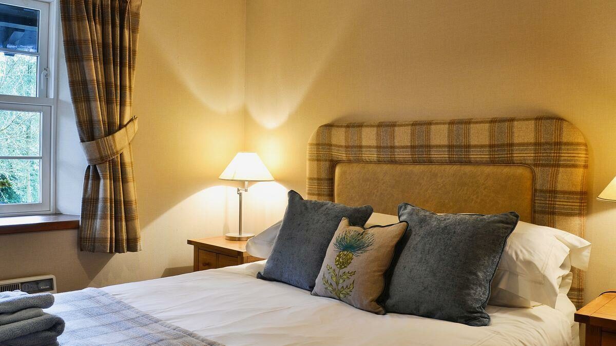 Bedroom of a cottage for a cosy winter break Scotland