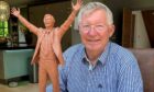 Sir Alex Ferguson with the maquette for the statue to honour him. Supplied by Aberdeen FC
