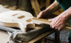 Whether making musical instruments or fixing cars, Scotland is full of skilled craftspeople - and they are all artists (Photo: Vita Yarmolyuk/Shutterstock)