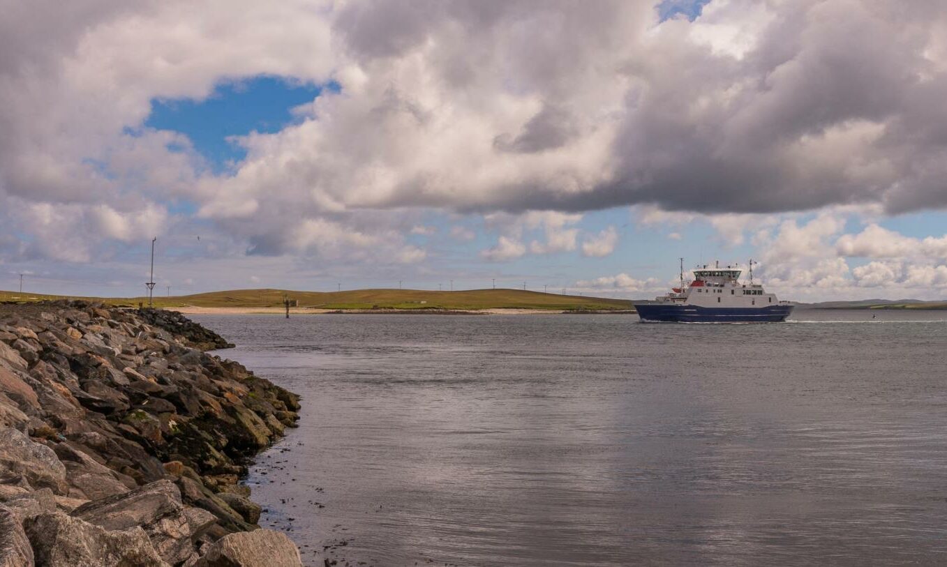 Car ferry coming across the water to the island of Yell.