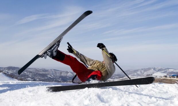 Ken has never quite mastered the art of skiing.