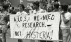 A group advocating AIDS research during the 14th annual Lesbian and Gay Pride parade in New York in 1983. The stigma remains.