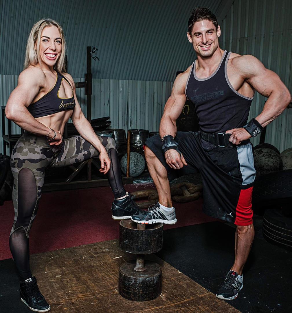 Steff Noble and Dr Andrew Chappell standing together in their workout gear