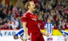 Mark Reynolds celebrates netting for Aberdeen against Real Sociedad in 2014.