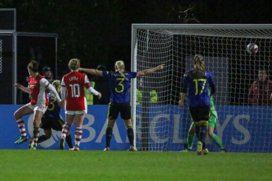 Man Utd players celebrate the winning goal in the FA Womens League Cup against Arsenal.