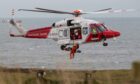 Coastguard teams winched the injured man from the rocks and he was taken to Ninewells Hospital in Dundee. Pic Paul Reid