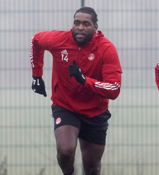 Player Jay Emmanuel-Thomas in Aberdeen jacket, shorts and gloves