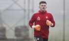 Young goalkeeper Tom Ritchie at Aberdeen training. Image: SNS