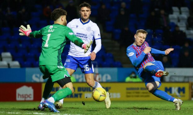 Billy Mckay sweeps home Caley Thistle's equaliser.