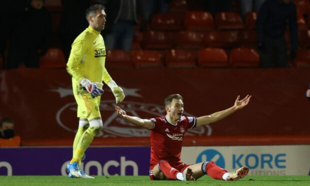 Aberdeen's Ryan Hedges appeals after a collision with Rangers' Allan McGregor when the game was 0-0.