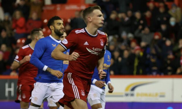 Aberdeen's Lewis Ferguson celebrates making it 1-1 from the penalty spot against Rangers.
