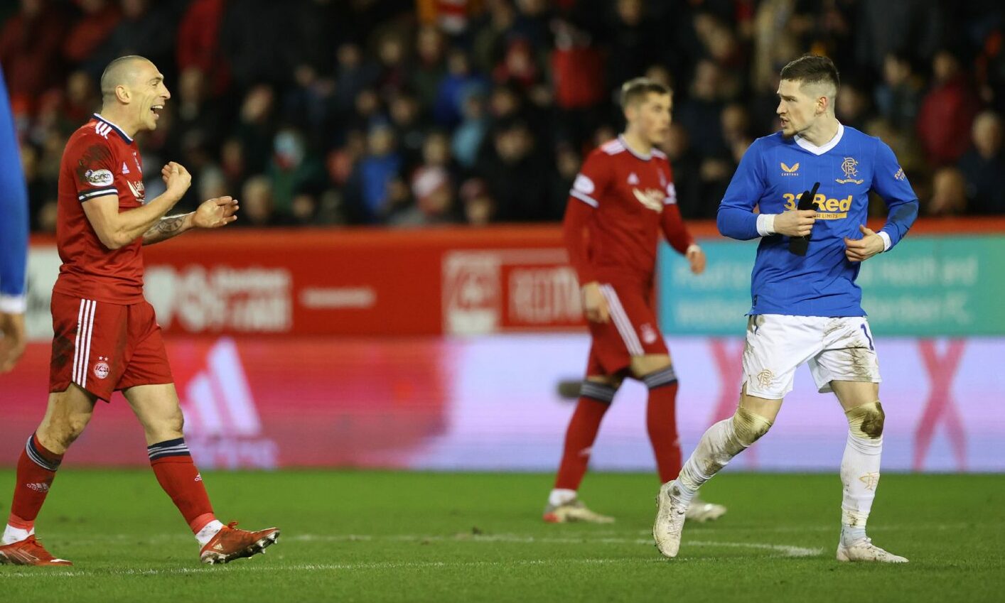 Scott Brown in dialogue with Ryan Kent after the Rangers midfielder's red card at Pittodrie.