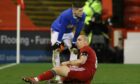 Referee Kevin Clancy sends off Rangers' Ryan Kent for a foul on Aberdeen' Scott Brown during a Cinch Premiership match between Aberdeen and Rangers at Pittodrie, on January 18, 2022 (Photo by Craig Williamson / SNS Group)