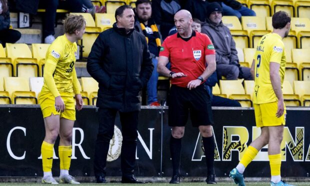 Referee Bobby Madden speaks to Ross County boss Malky Mackay.