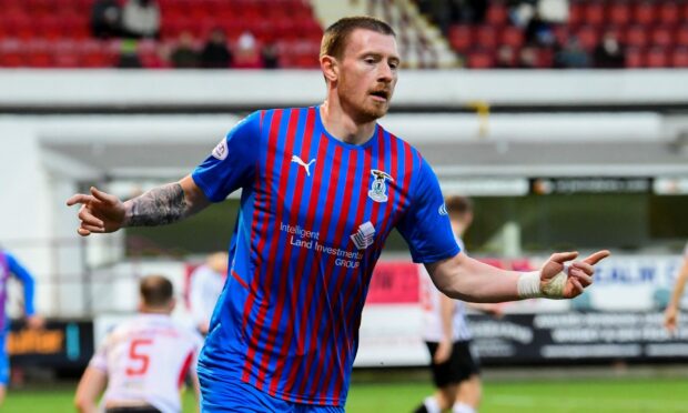 ICT striker Shane Sutherland celebrates his first half goal against Dunfermline.