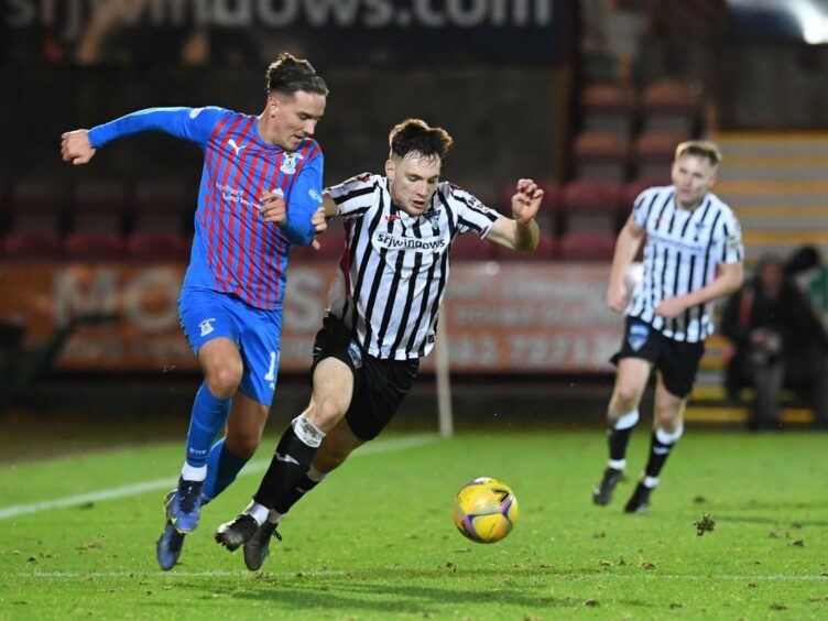 ICT's Logan Chalmers, left, and Dunfermline's Ryan Edwards during the cinch Championship match.