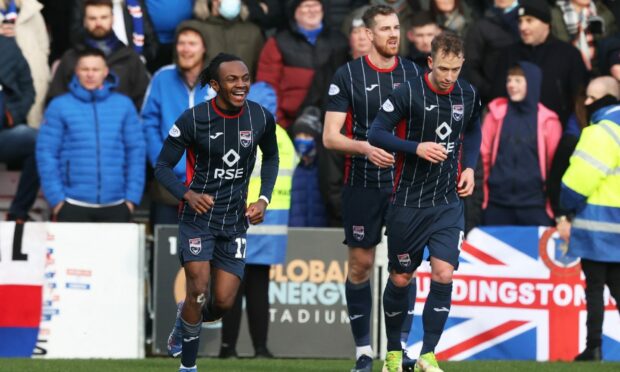 Regan Charles Cook celebrates after scoring to make it 2-1 Ross County against Rangers.