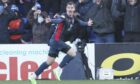 Matthew Wright celebrates after scoring a late equaliser against Rangers last season. Image: SNS