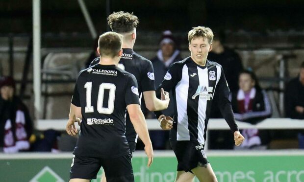 Kane Hester, right, celebrates after scoring the opener for Elgin against Kelty Hearts on Tuesday.