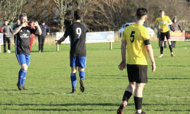 St Duthus striker Ben Bruce celebrates after scoring against Nairn County reserves.