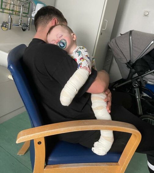 Blake Nilssen, 10 months, with his dad Daryl Nilssen was treated for his burns in hospital following the incident at his Aberdeen nursery