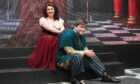 Jo Gallagher as Esmerelda and Jonnie Milne as Quasimodo in The Hunchback Of Notre Dame, staged by Phoenix Theatre.