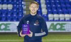 Cove Rangers midfielder Blair Yule with the League One player of the month award for December