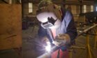 A Dales Engineering Services Limited apprentice welder at the firm's base in Peterhead