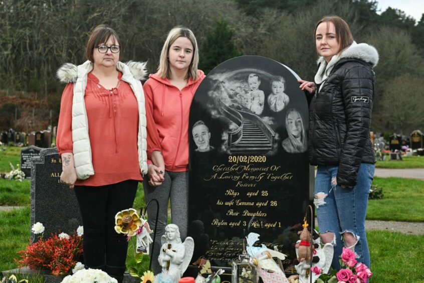 Samantha Cousin, with Rhys's sisters Vikki Swenson and Jamie Lee at Kilvean Cemetery in Inverness